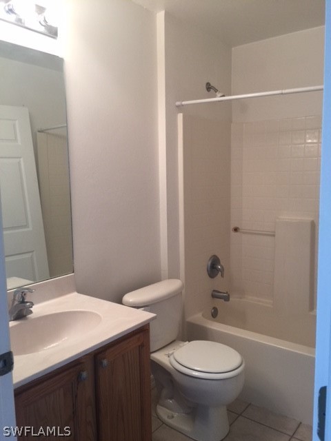 3608 13th Street Southwest Lehigh Acres, FL 33976 - Photo 6 of 11 a bathroom with a sink a toilet and shower
