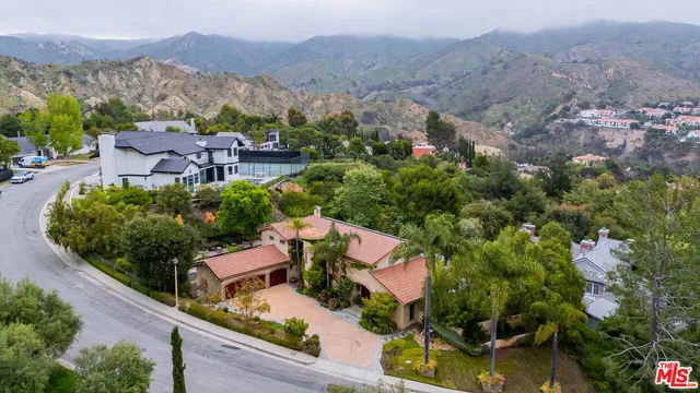 an aerial view of house with an outdoor space