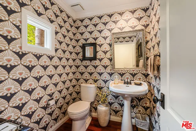 a bathroom with a sink and a toilet