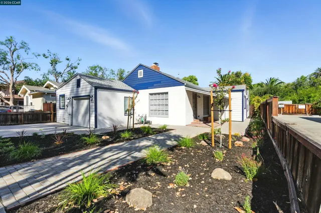 a house view with a garden space