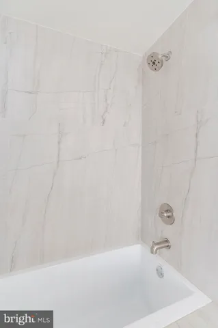 a bathroom with a bathtub