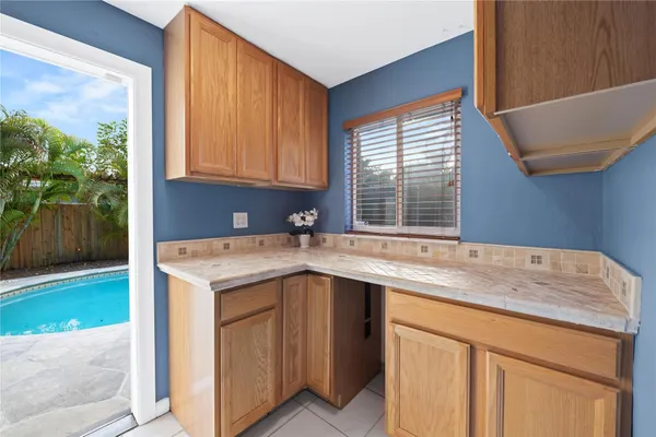 a kitchen with a sink and a window