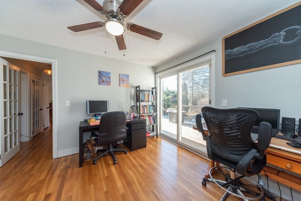 112 Elmwood Street Auburn, MA 01501 - Photo 18 of 40 a living room with furniture and a wooden floor
