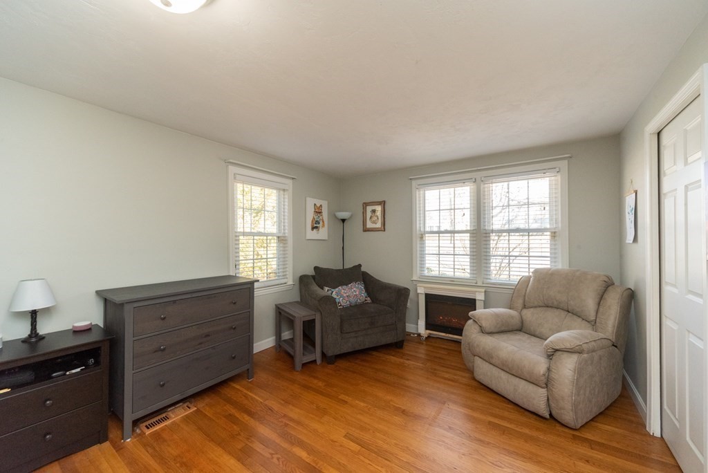 112 Elmwood Street Auburn, MA 01501 - Photo 20 of 40 a living room with furniture and a window