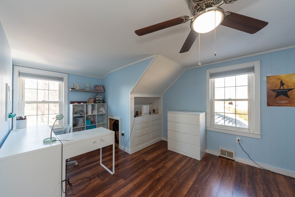 112 Elmwood Street Auburn, MA 01501 - Photo 30 of 40 a workspace with wooden floor and windows