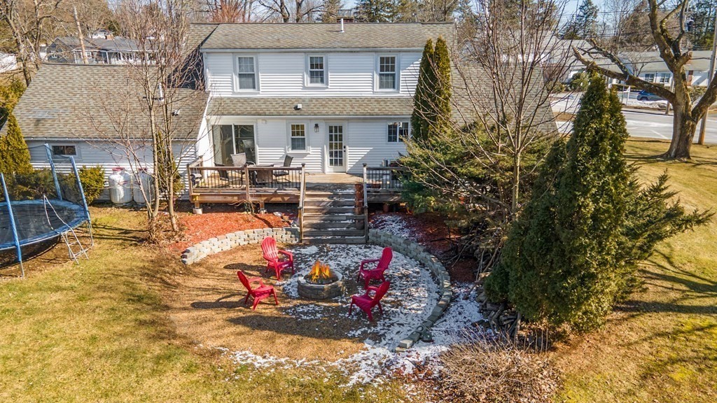 112 Elmwood Street Auburn, MA 01501 - Photo 3 of 40 a view of a house with a patio