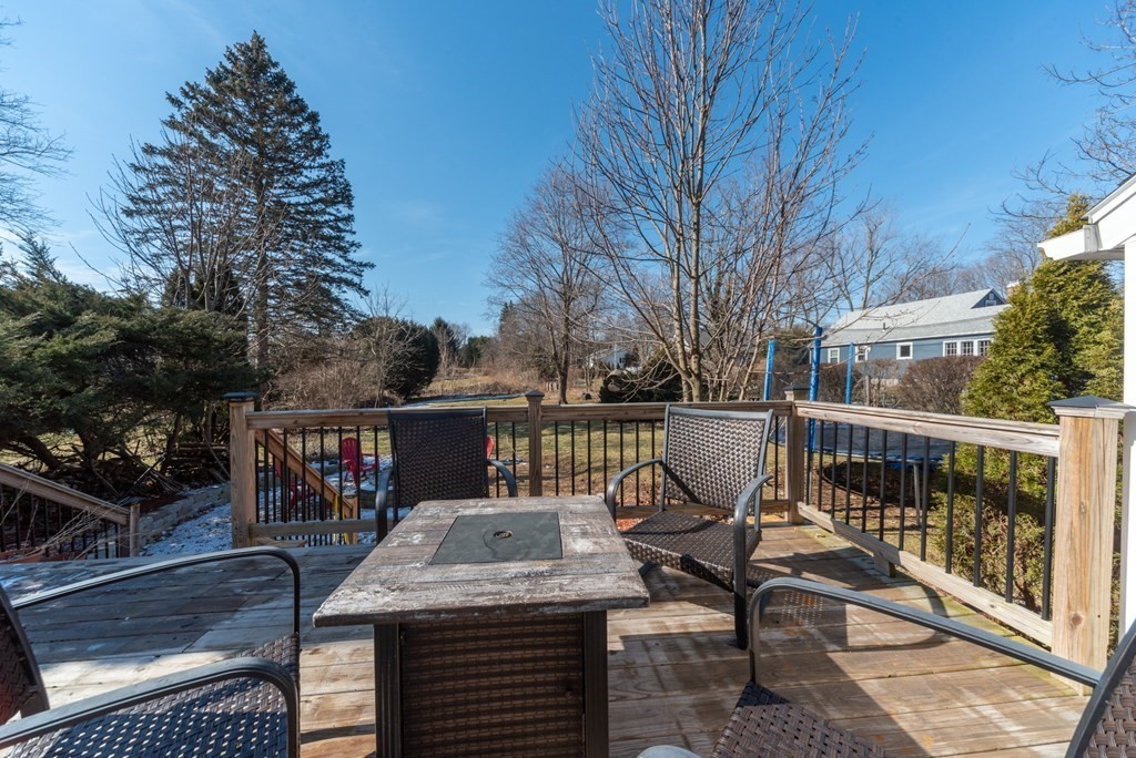 112 Elmwood Street Auburn, MA 01501 - Photo 35 of 40 a view of a balcony with two chairs and a table
