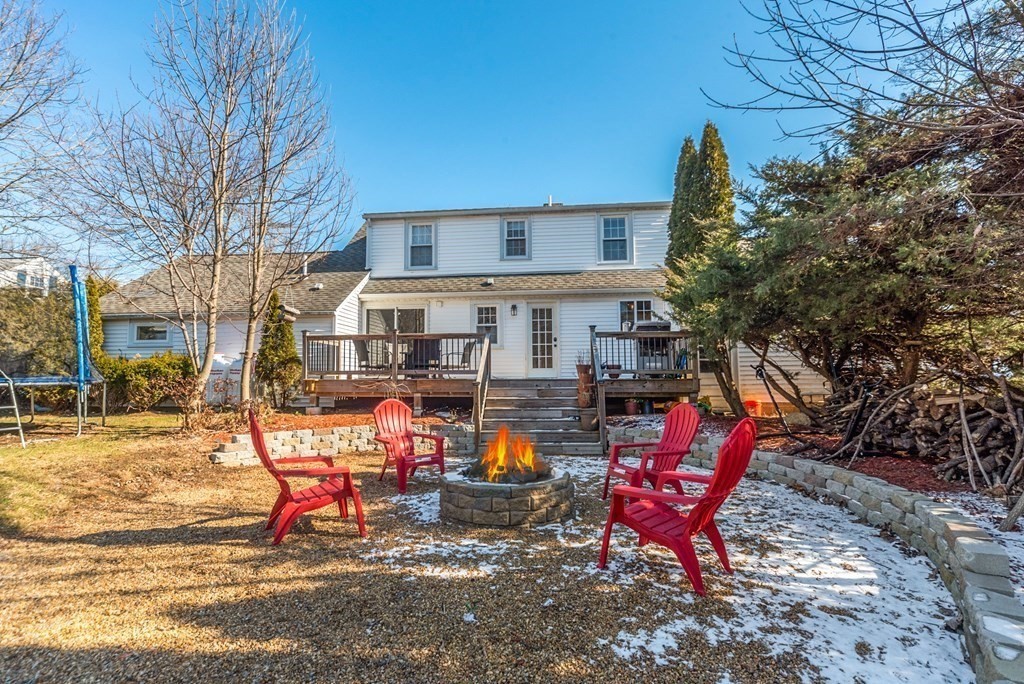 112 Elmwood Street Auburn, MA 01501 - Photo 39 of 40 a glass bench sitting in front of a building