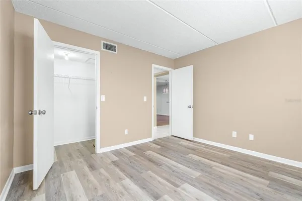 a view of a glass door with a balcony