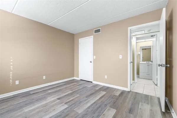 a view of a house with a yard and plants