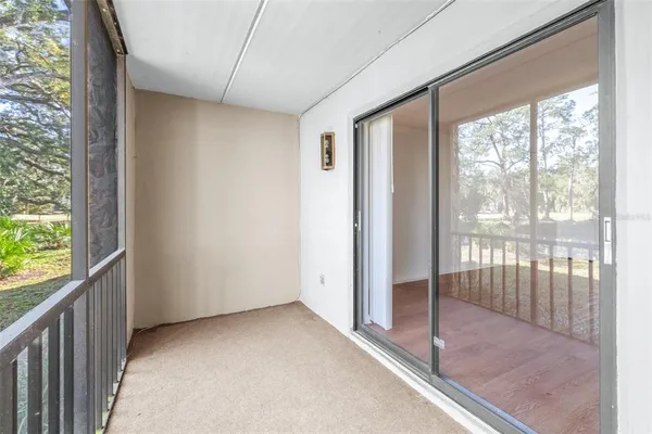 an aerial view of a house with yard