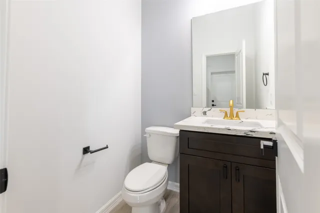a bathroom with a sink and a toilet