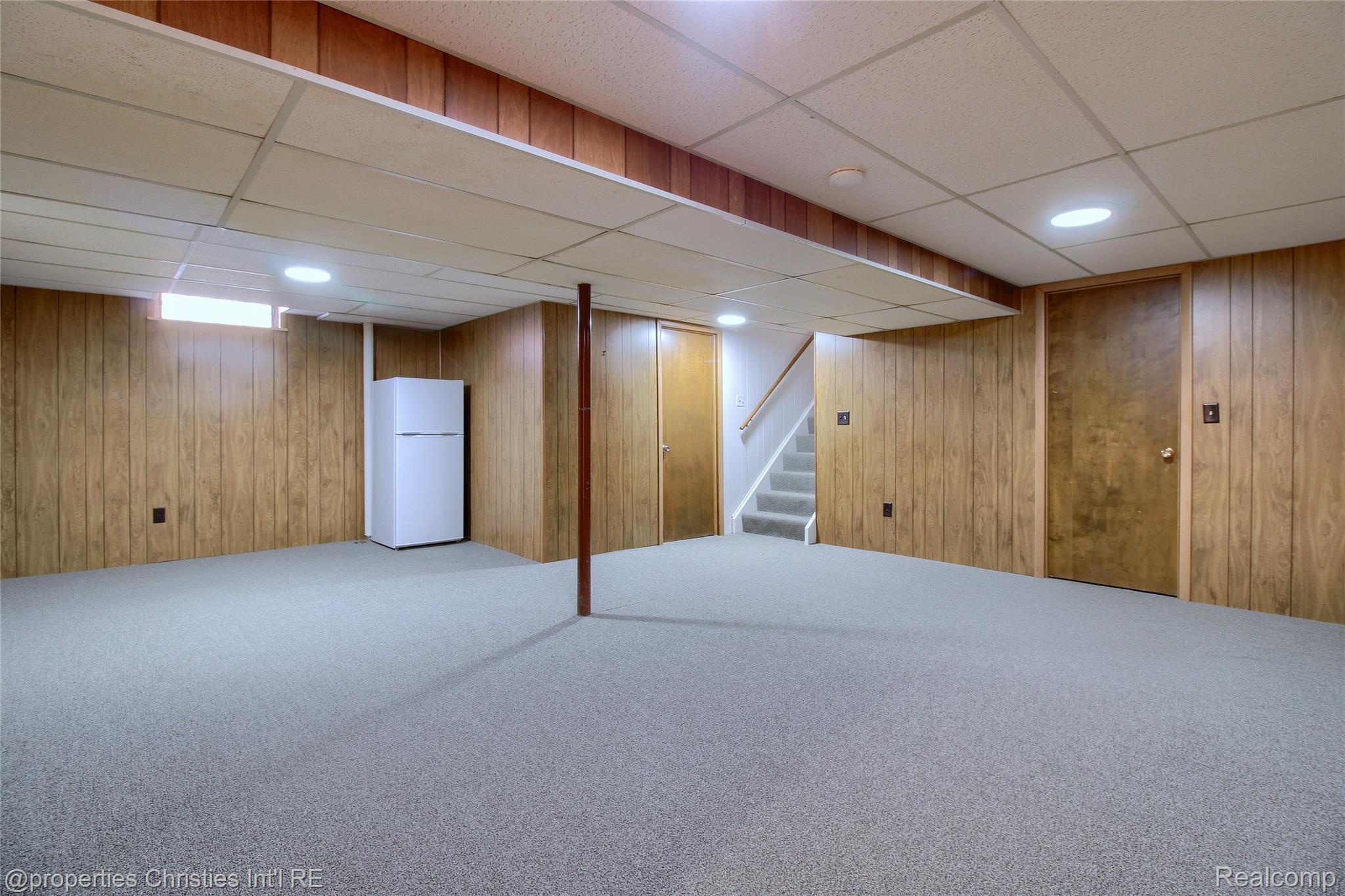 565 Center Ridge South Lyon, MI 48178 - Photo 23 of 37 Finished basement family room area