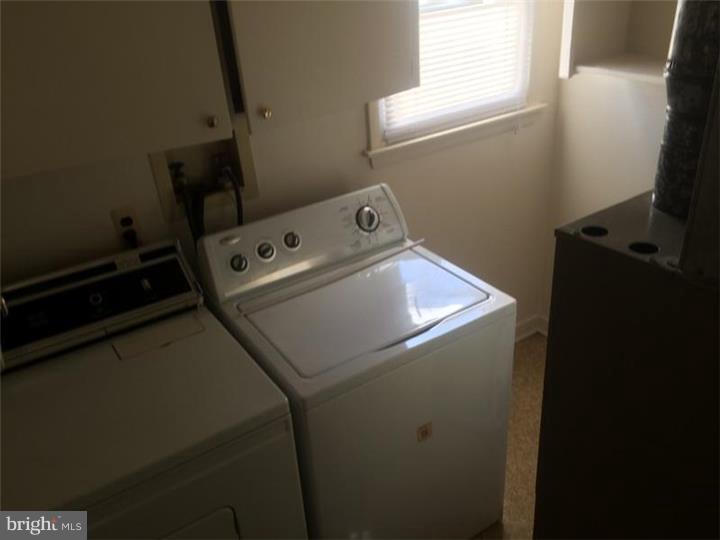 697 Klockner Road Hamilton, NJ 08619 - Photo 8 of 11 a utility room with dryer and washer