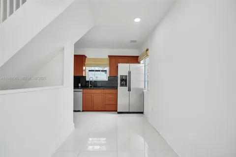 a view of a kitchen with a sink
