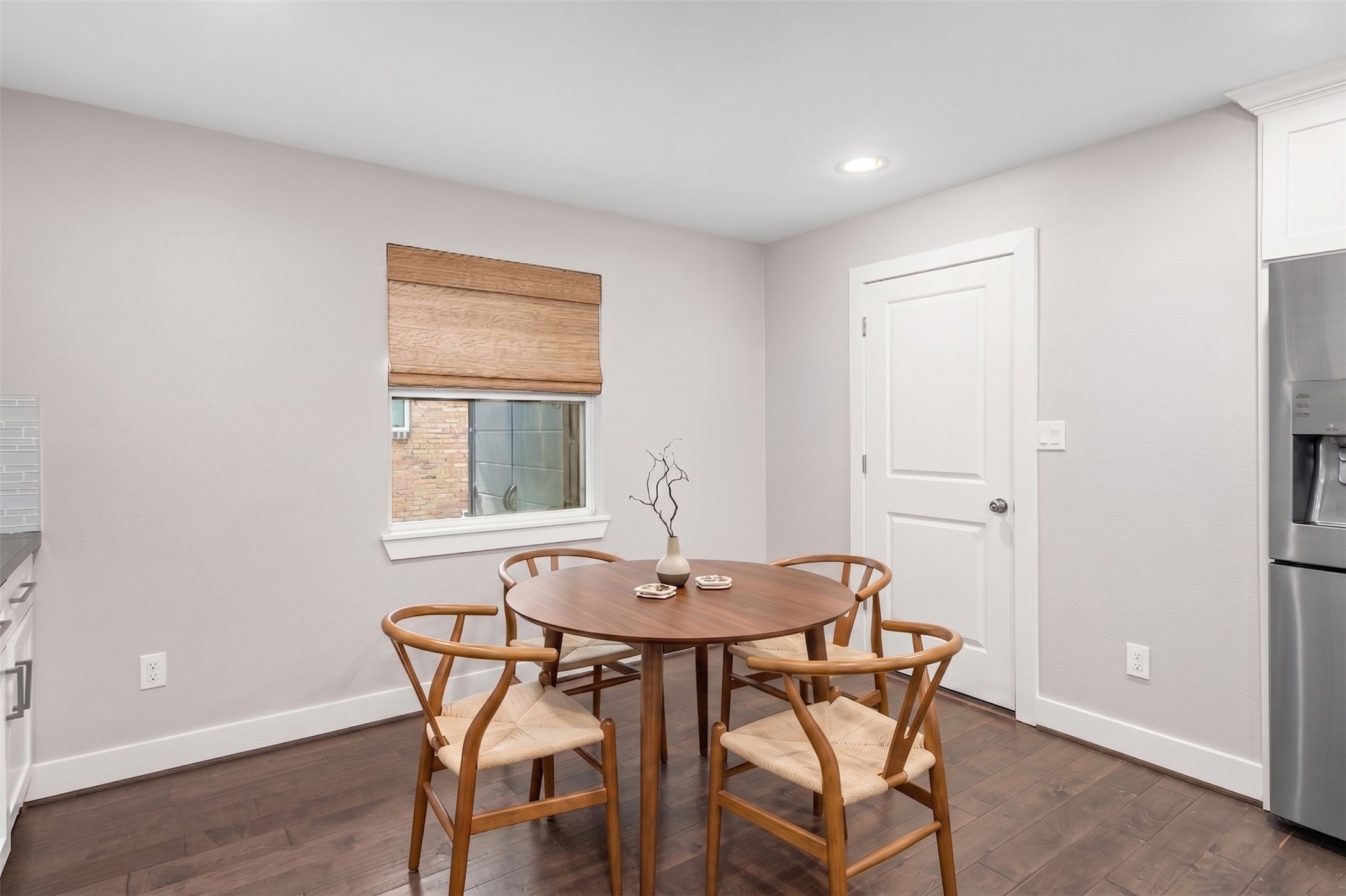 5723 Spellman Road Houston, TX 77096 - Photo 12 of 29 The breakfast area offers a comfortable space for casual dining within the kitchen, with natural light from the window and plenty of room for a table and chairs. Virtually Staged.