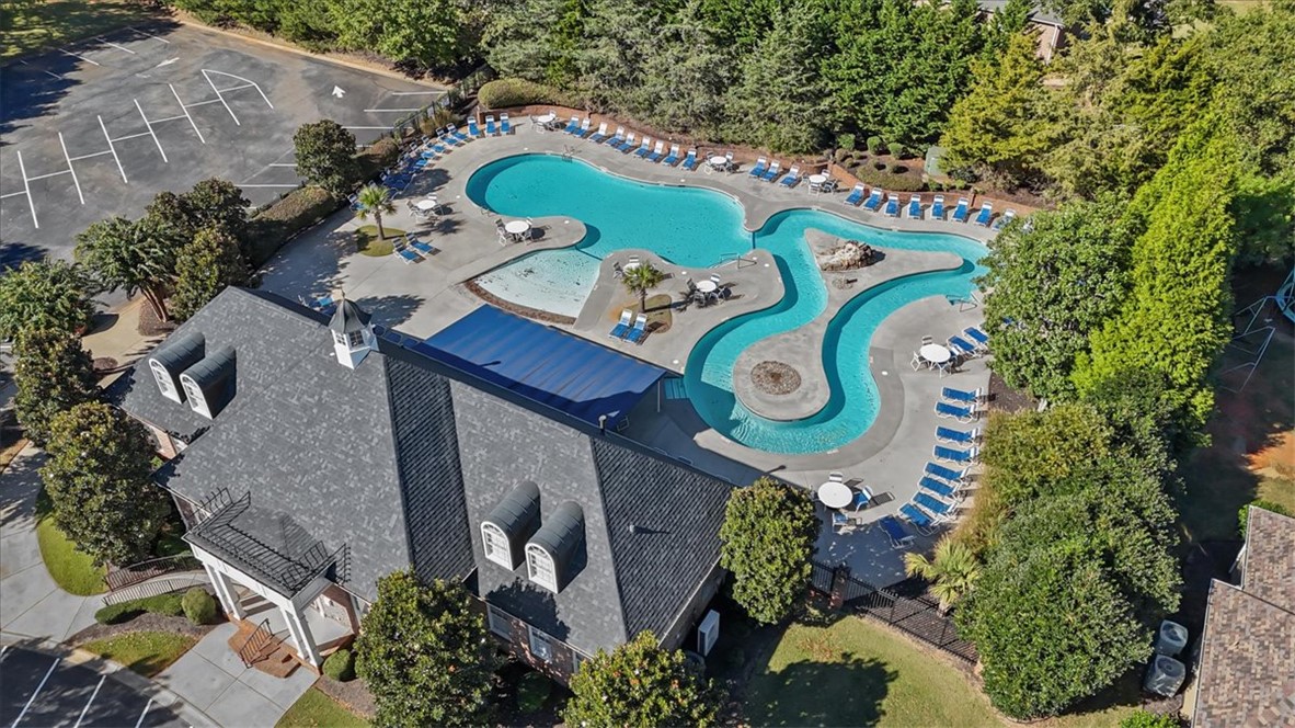 105 Bree Drive Anderson, SC 29621 - Photo 42 of 48 An aerial perspective reveals a clubhouse, inviting pool area with a lazy river, and ample parking.