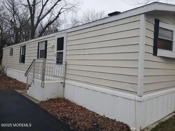 a view of a house with a garage