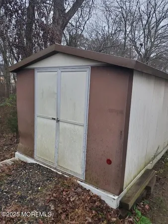 a bathroom with a bathtub and a toilet