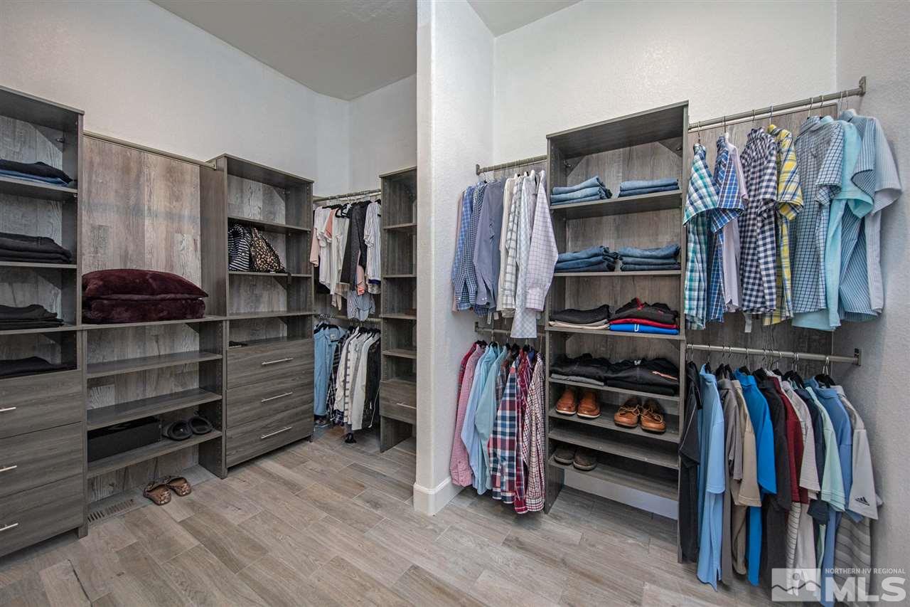 8345 Fairway Ridge Court Reno, NV 89523 - Photo 24 of 40 a view of walk in closet with clothes and shoes