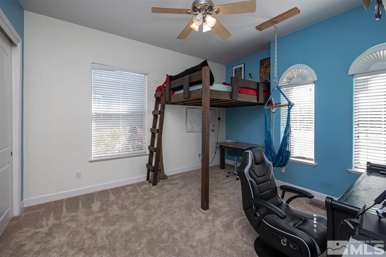 8345 Fairway Ridge Court Reno, NV 89523 - Photo 27 of 40 a view of a workspace with furniture and a window