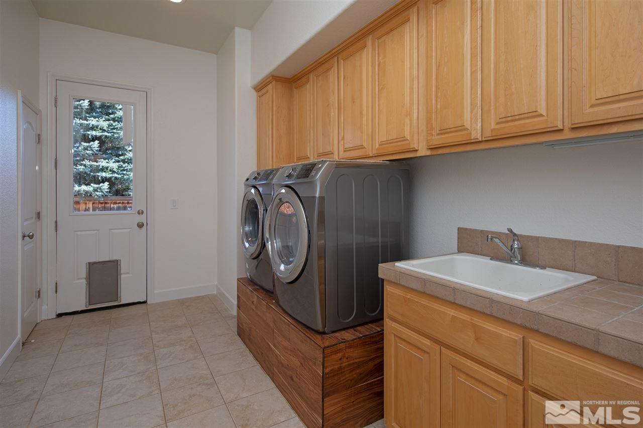 8345 Fairway Ridge Court Reno, NV 89523 - Photo 31 of 40 a utility room with dryer and washer