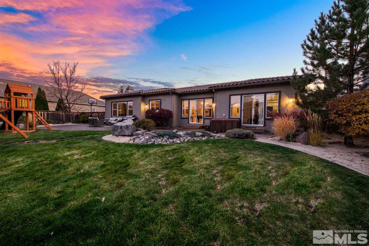 8345 Fairway Ridge Court Reno, NV 89523 - Photo 34 of 40 a view of a house with a backyard porch and sitting area