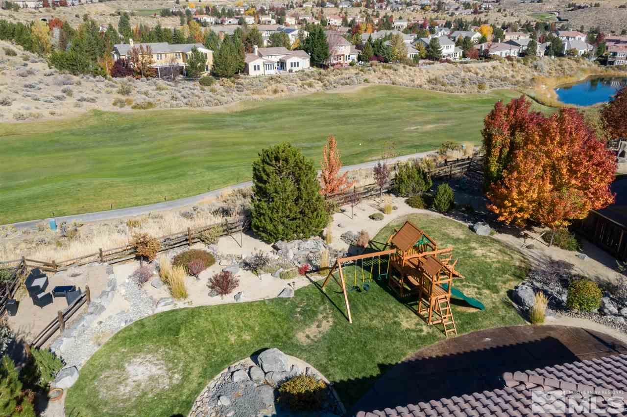 8345 Fairway Ridge Court Reno, NV 89523 - Photo 39 of 40 a view of a lake with a city