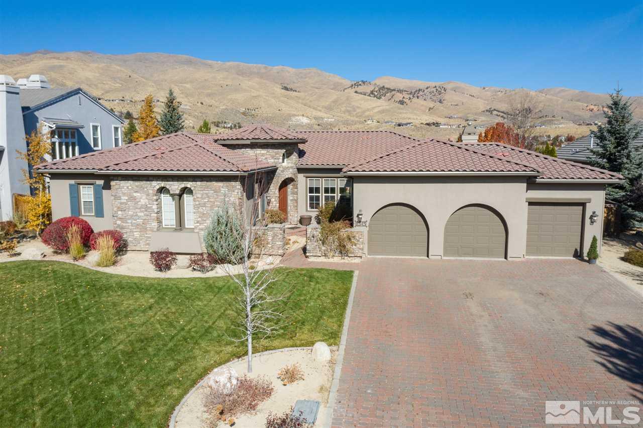 8345 Fairway Ridge Court Reno, NV 89523 - Photo 5 of 40 a front view of a house with garden