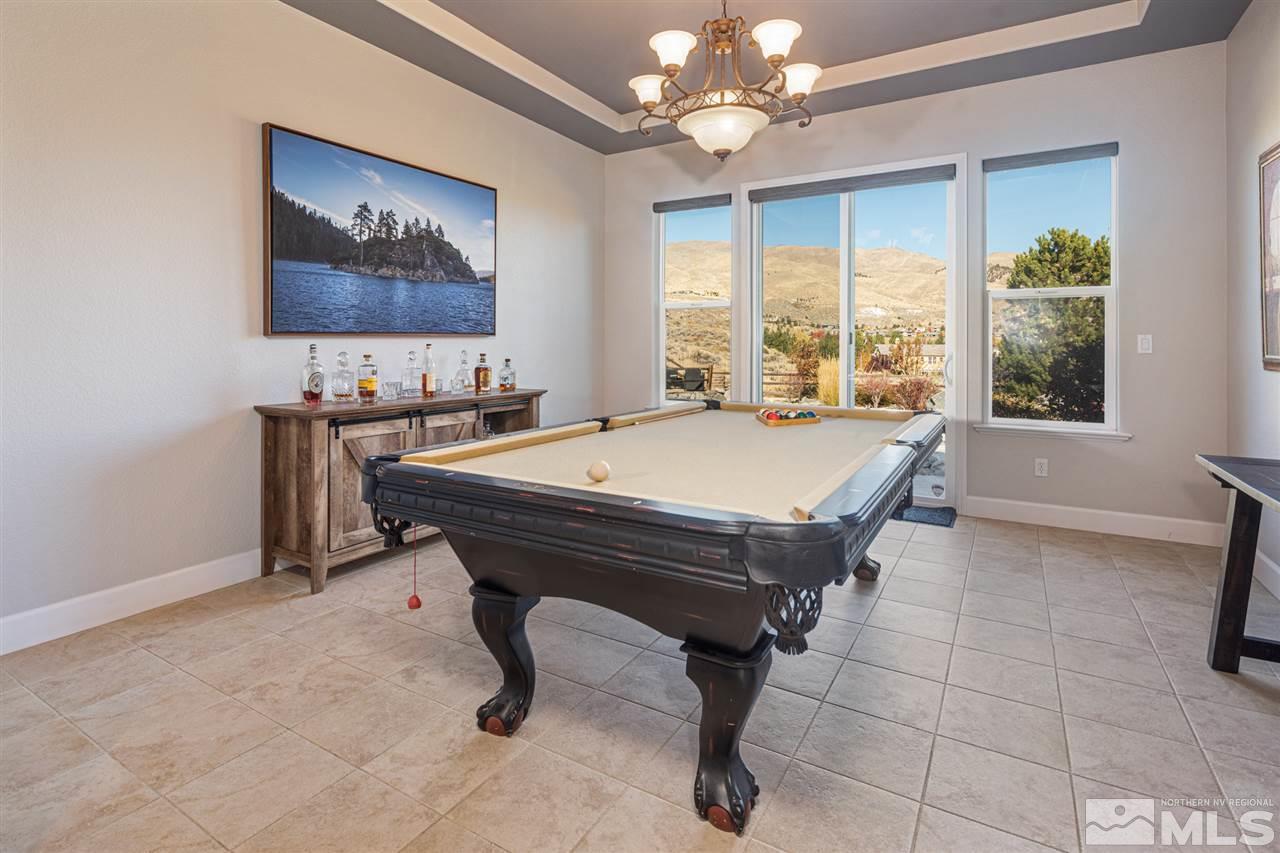 8345 Fairway Ridge Court Reno, NV 89523 - Photo 8 of 40 a room with pool table and windows