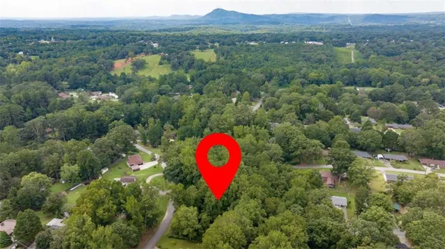 a view of a street with a sign board