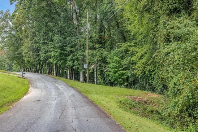 a view of a yard with an outdoor seating