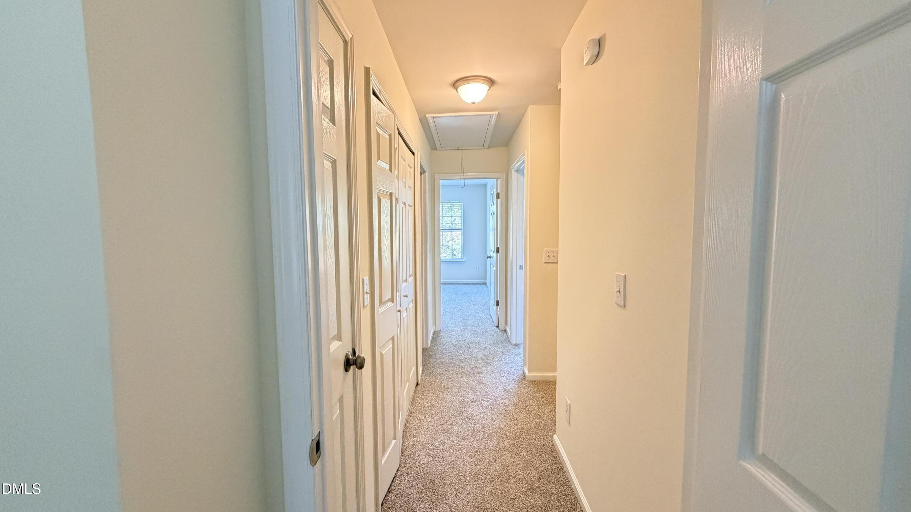 4123 Standing Rock Way Raleigh, NC 27604 - Photo 19 of 29 a view of a bathroom from a corridor