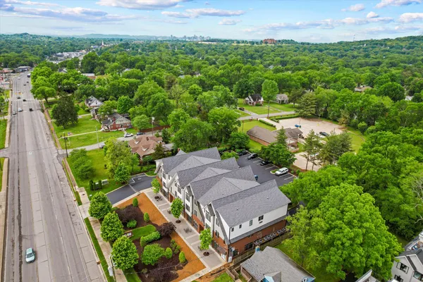 an aerial view of a house with a garden