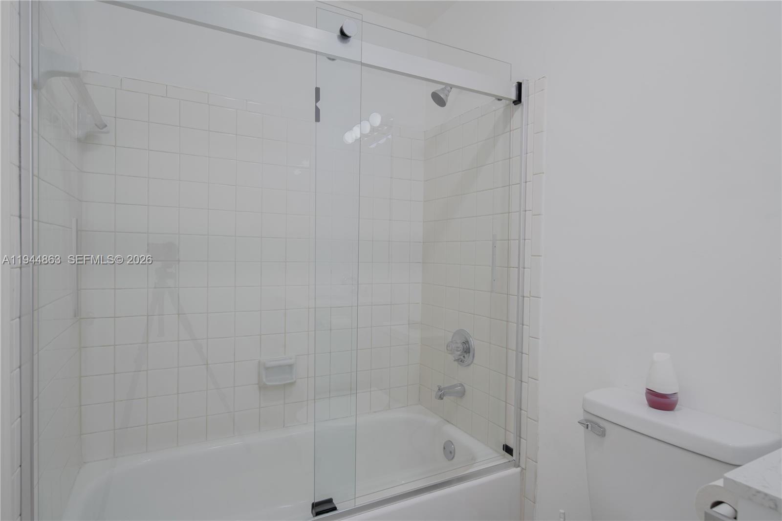 2830 Riverside Drive, Unit 2013 Coral Springs, FL 33065 - Photo 12 of 14 a close up of a bathtub curtain