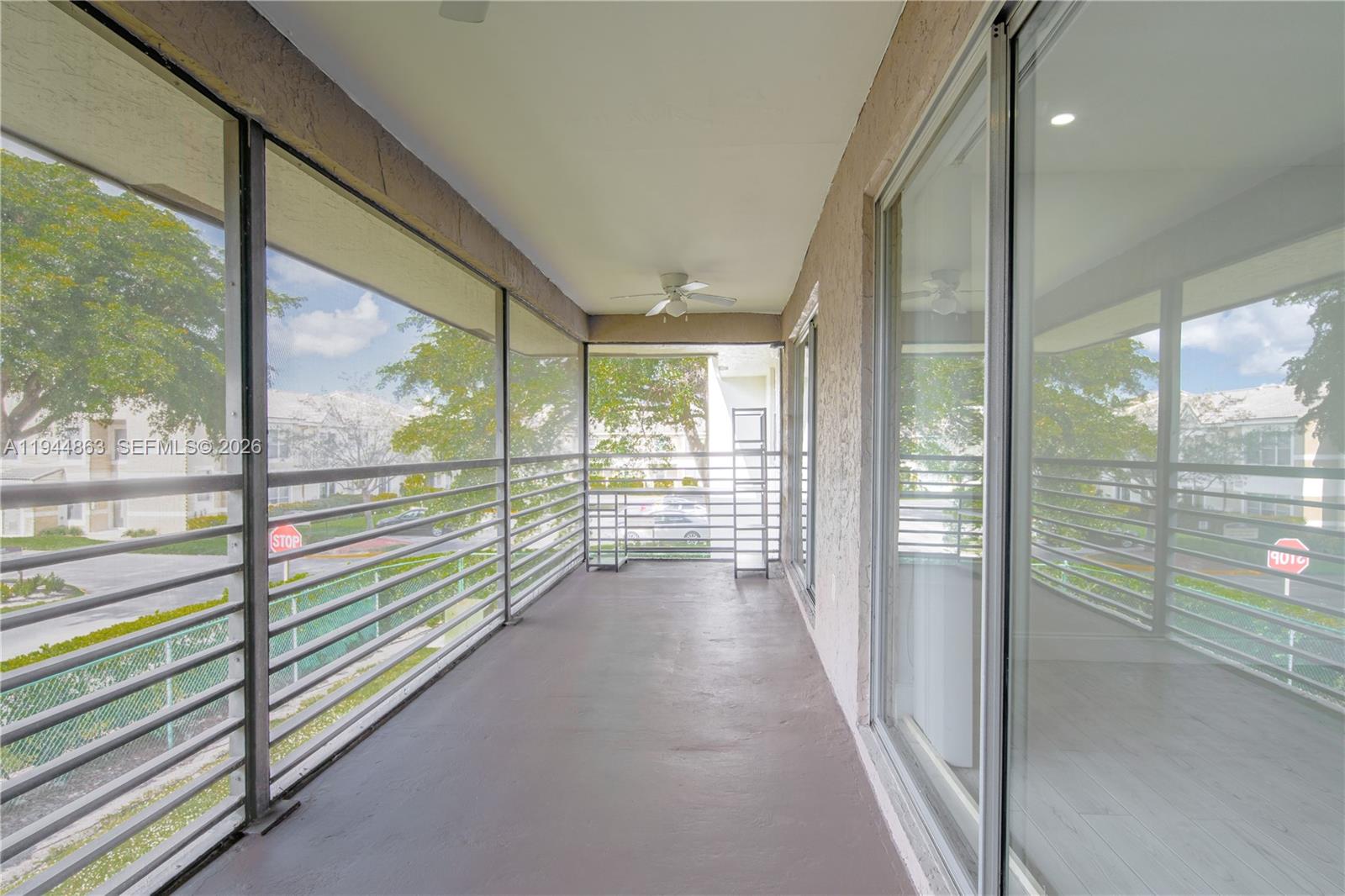 2830 Riverside Drive, Unit 2013 Coral Springs, FL 33065 - Photo 14 of 14 a view of a city from a balcony