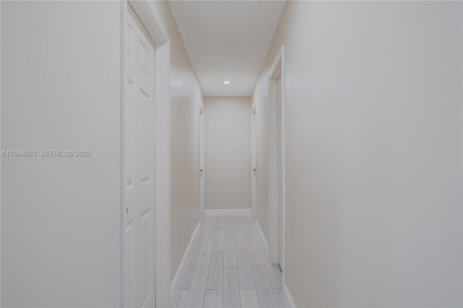 2830 Riverside Drive, Unit 2013 Coral Springs, FL 33065 - Photo 6 of 14 a view of a hallway