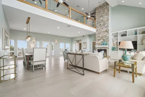 a living room with furniture and a table
