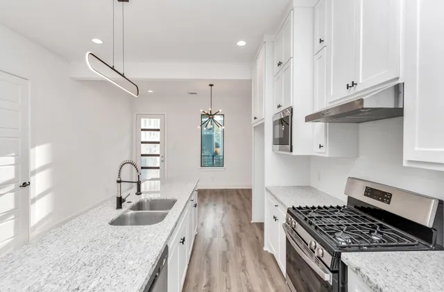 a picture of a bench in front of a window