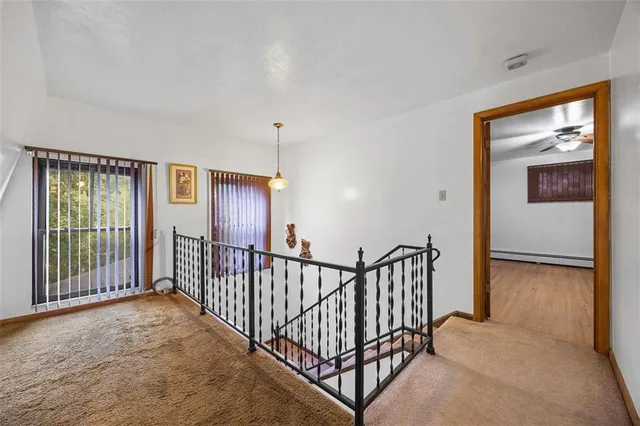 a view of hallway with livingroom