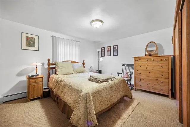 a bedroom with a bed and a closet