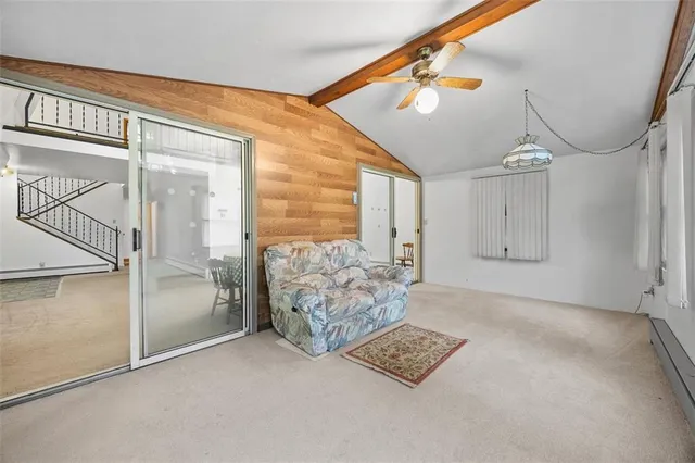 a view of livingroom with furniture and windows
