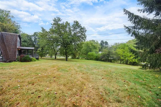 a house view with garden space