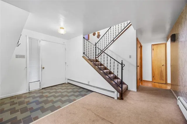 a view of an entryway with staircase