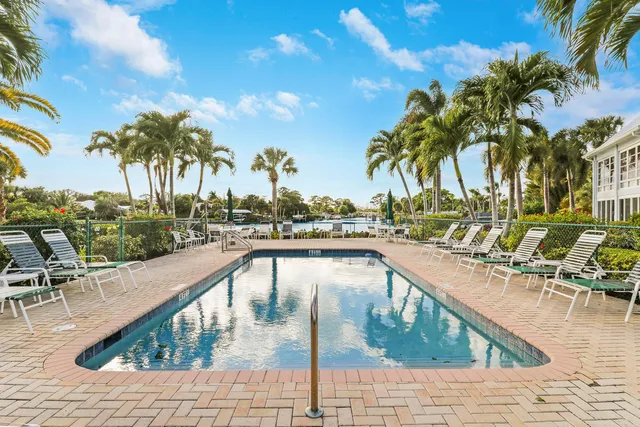 a view of a lake with a garden