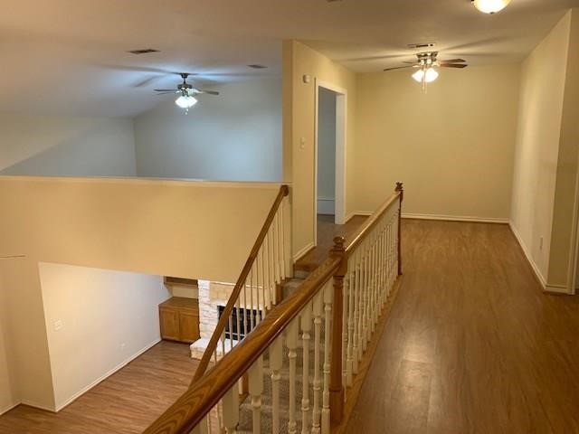 1922 20th Street Huntsville, TX 77340 - Photo 12 of 49 a view of a hallway with wooden floor