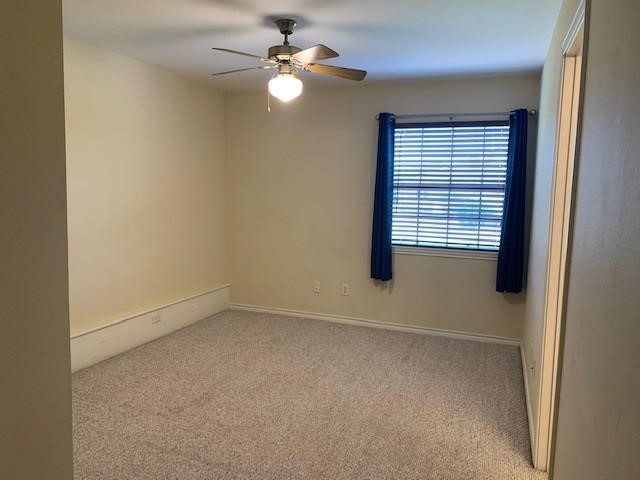1922 20th Street Huntsville, TX 77340 - Photo 24 of 49 an empty room with a window