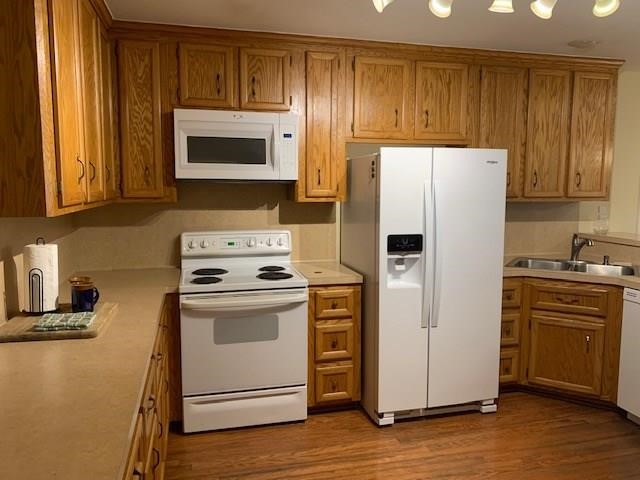 1922 20th Street Huntsville, TX 77340 - Photo 30 of 49 a kitchen with a refrigerator stove and sink