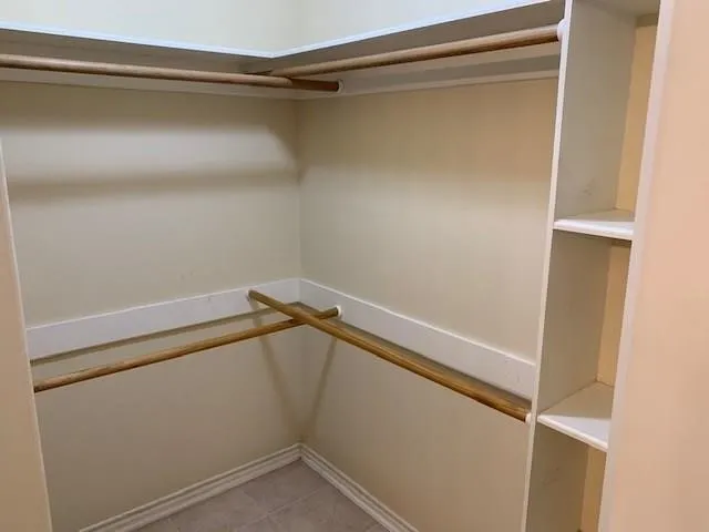 a view of a room with racks on the wall