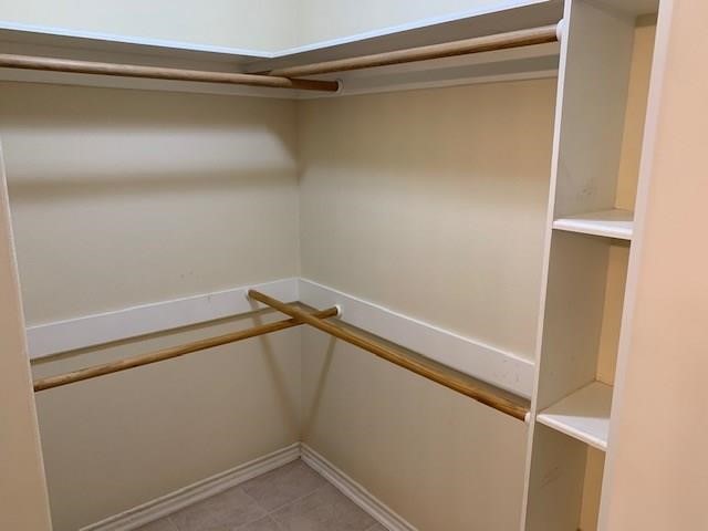 1922 20th Street Huntsville, TX 77340 - Photo 43 of 49 a view of a room with racks on the wall